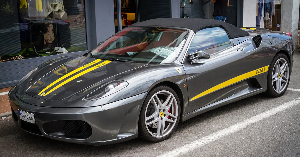 Grey Ferrari with stripes in Puerto Jose Banus — Best Restaurants for a Date, 2026 guide
