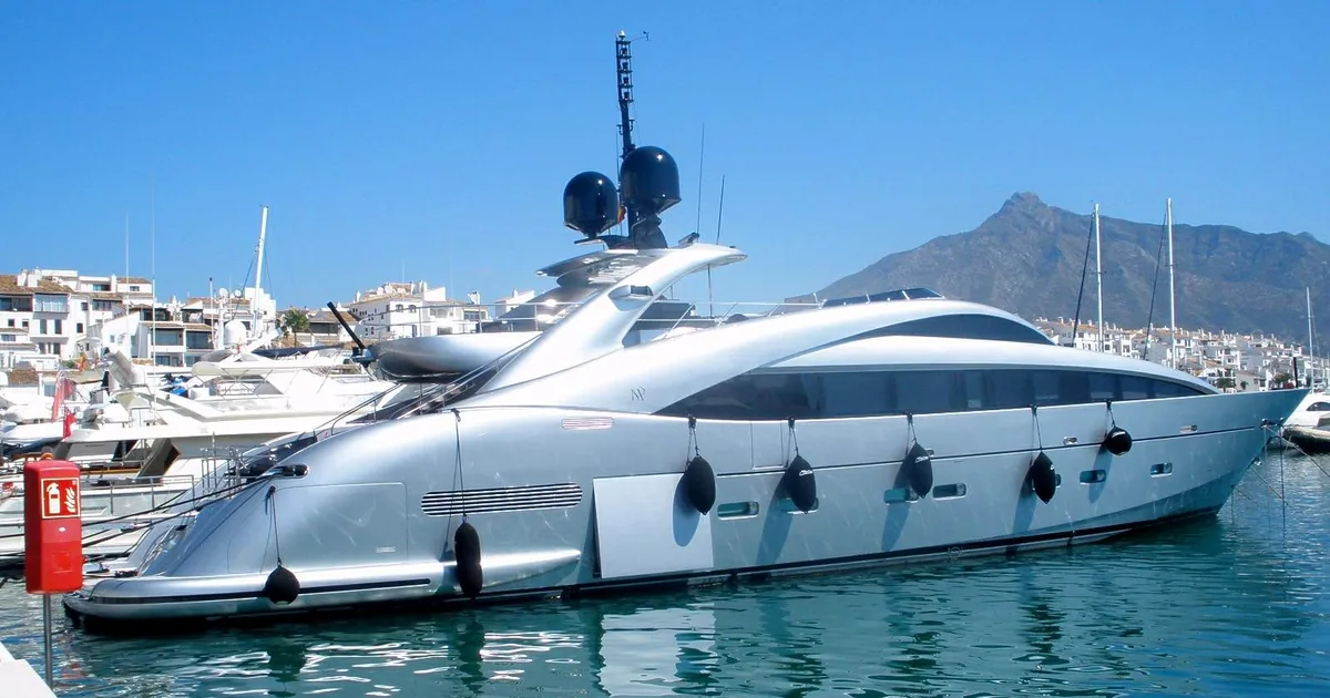 Motor yacht moored in Puerto Banús marina with La Concha mountain behind — 7-day luxury Marbella itinerary