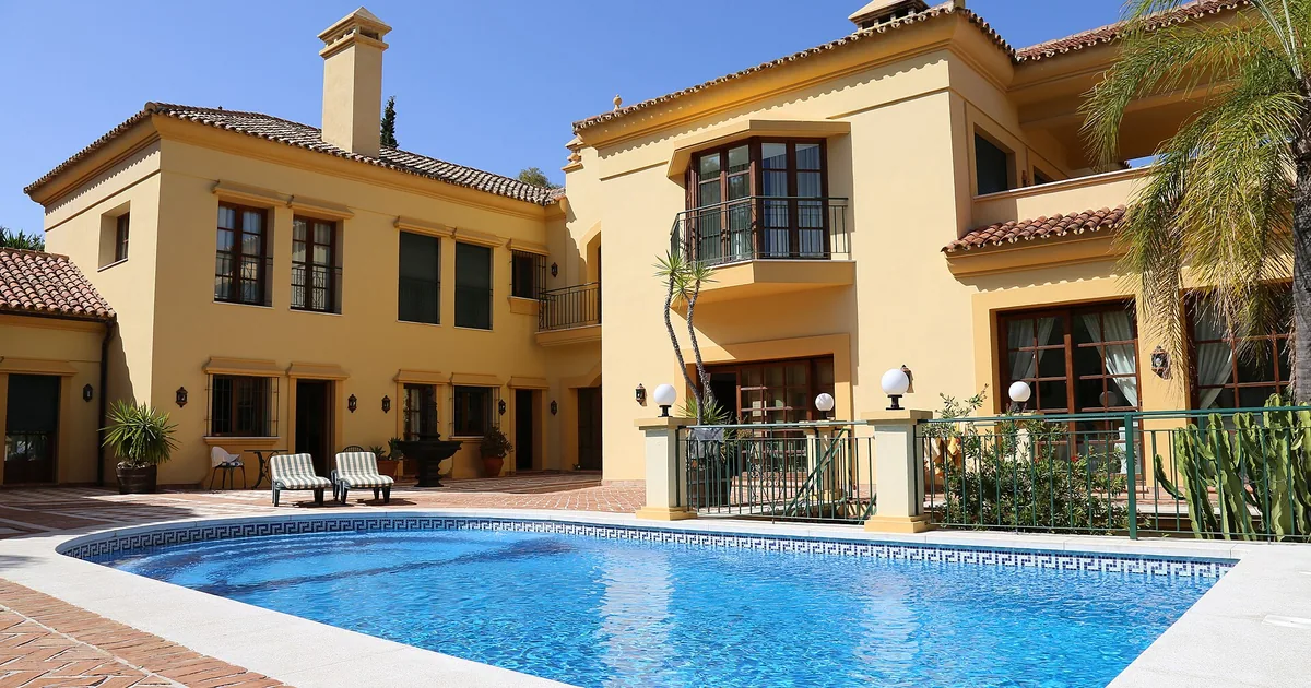 Andalusian-style private villa with a swimming pool in Marbella — hotels vs villas compared