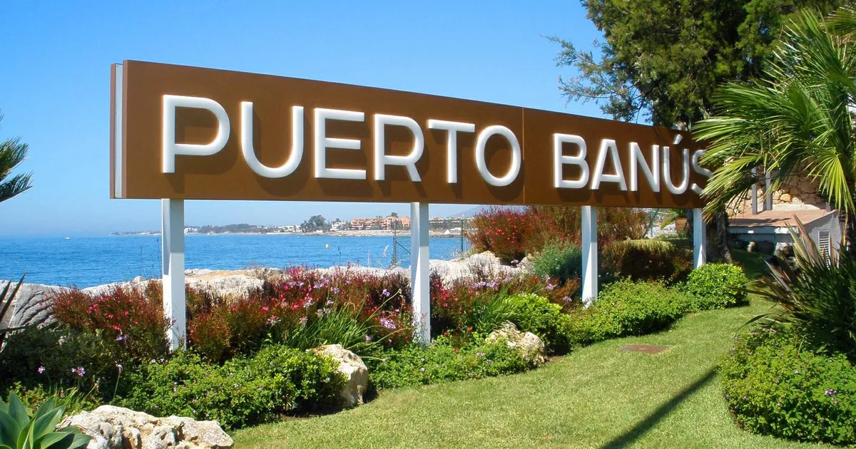 The Puerto Banús sign above the sea at the marina entrance, Marbella — film festival visitor guide