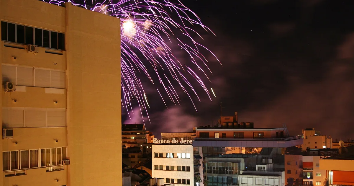 Fireworks bursting over the rooftops of Marbella at night — New Year's Eve in Marbella