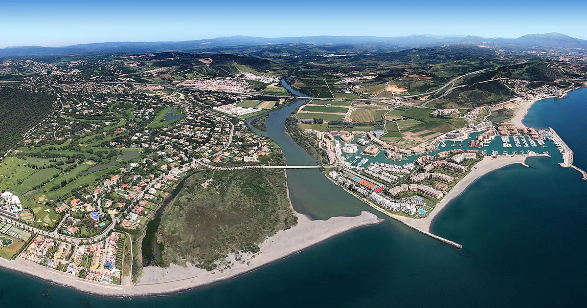 Aerial view of Sotogrande with its marina, golf courses and the Guadiaro river mouth — Sotogrande polo season calendar