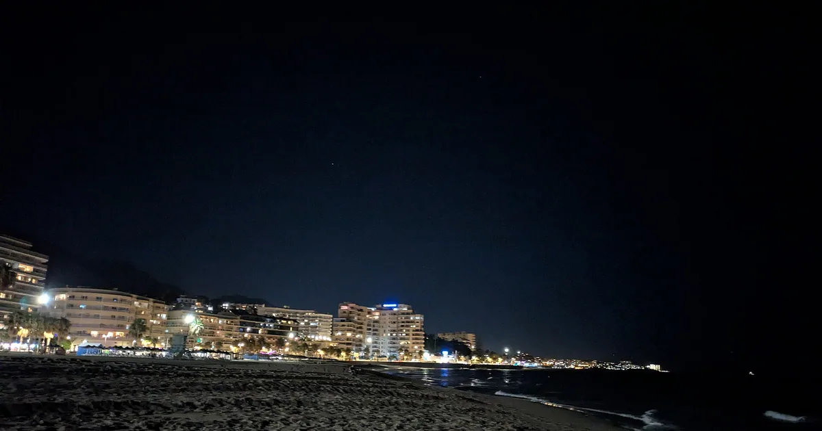 Fuengirola beachfront buildings at night — Tibu Marbella, 2026 guide
